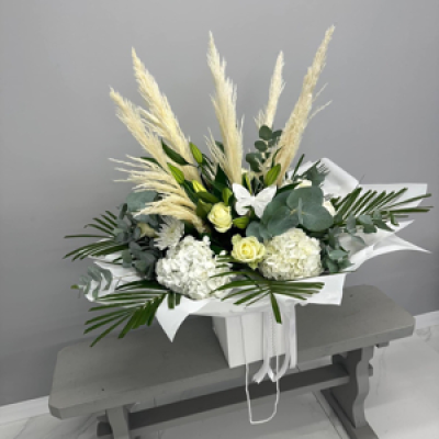 White and cream Bouquet - White and cream bouquet of lillies, roses, hydrangeas, blooms and pampas gift wrapped in a bag of water