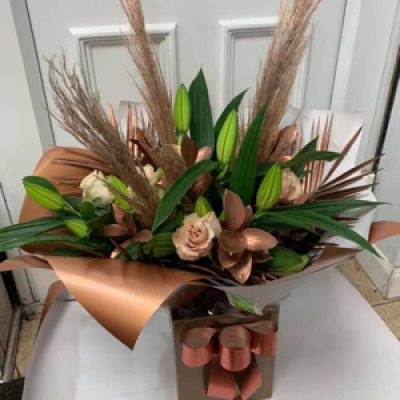 Rose gold pampas aqua pack - White lillies, peach roses, rose gold foliage and pampas grass in rose gold packaging